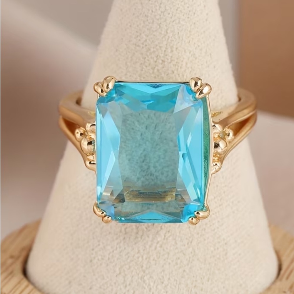 18k Gold Plated Ring with Vibrant Blue Aquamarine Emerald-Cut Stone - Picture 6 of 7